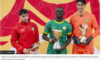 BBC/Getty Images Morocco’s Brahim Díaz (left) looks distraught as he accepts the tournament’s Golden Boot award after missing his penalty
